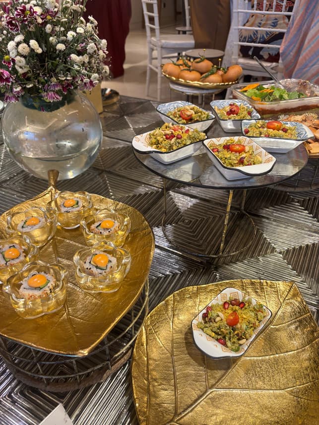 Chaat and salads in gold-accented serveware