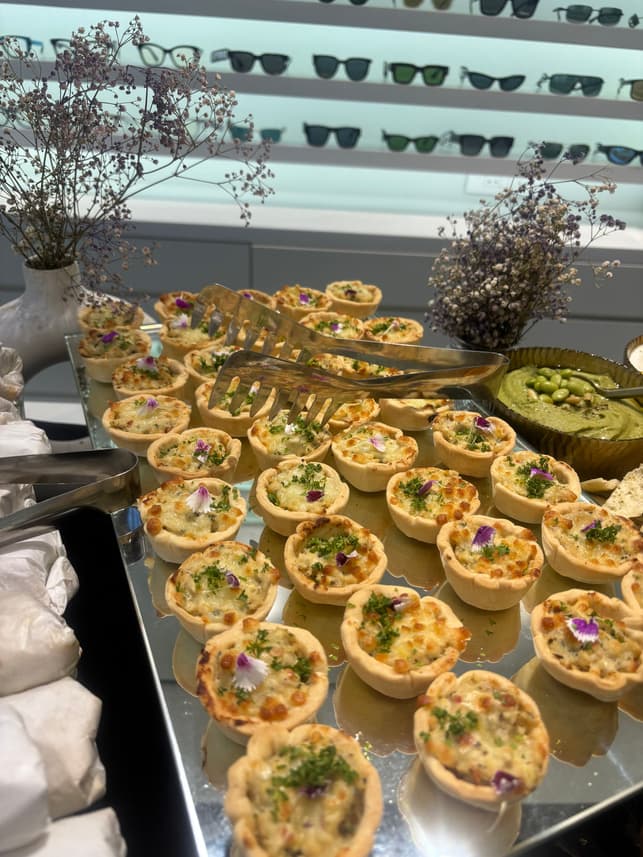 Assorted mini quiches on a buffet table