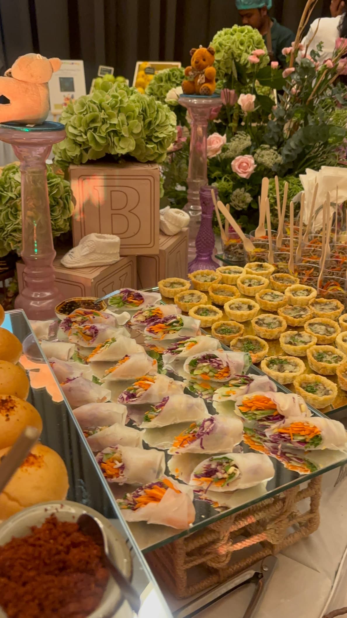 Grazing table with Vietnamese rolls and savoury tartlets